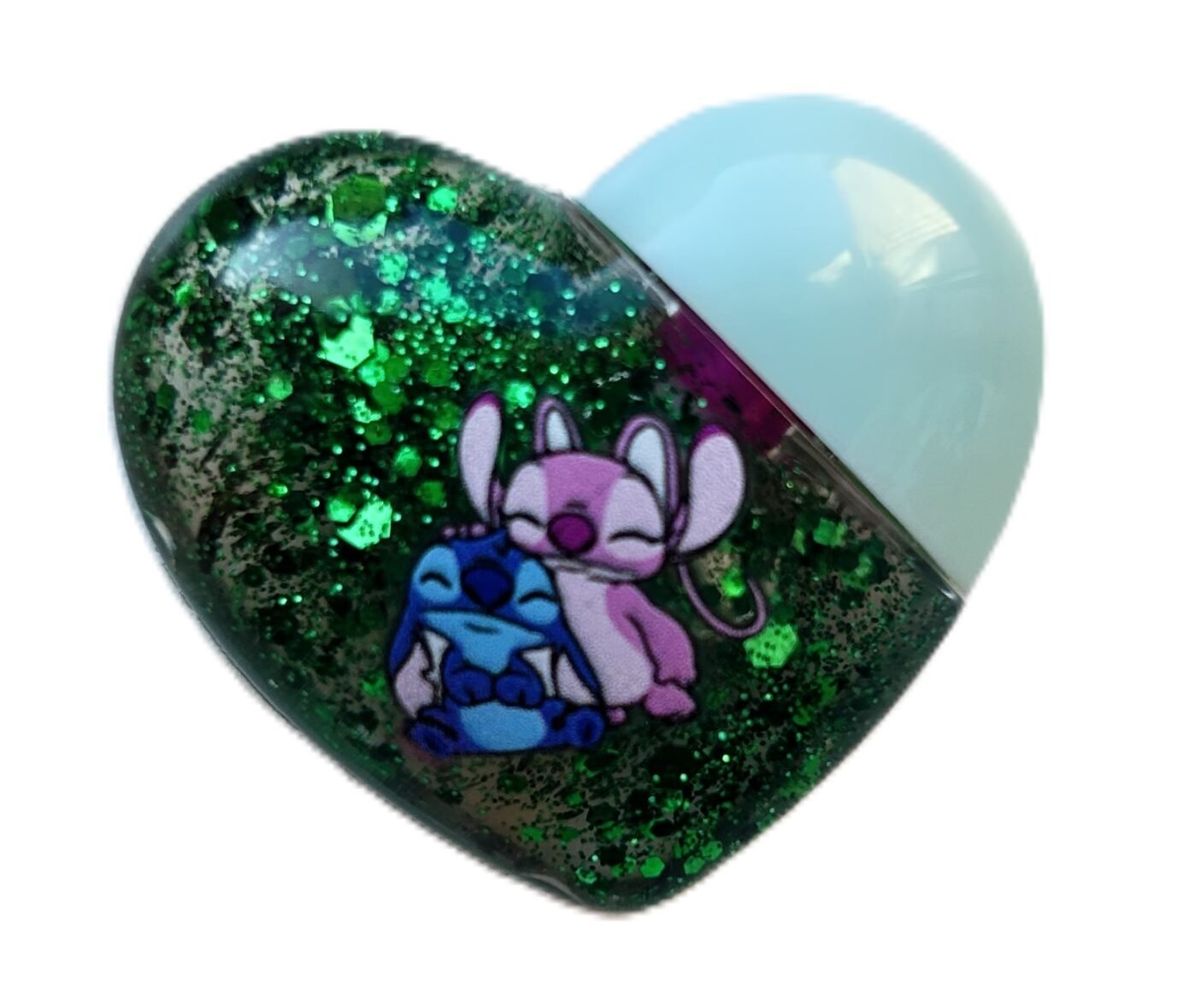 Stitch spalvą keičiantis lūpų blizgis – širdelės formos dizainas 10 g. (žalia pakuotė)