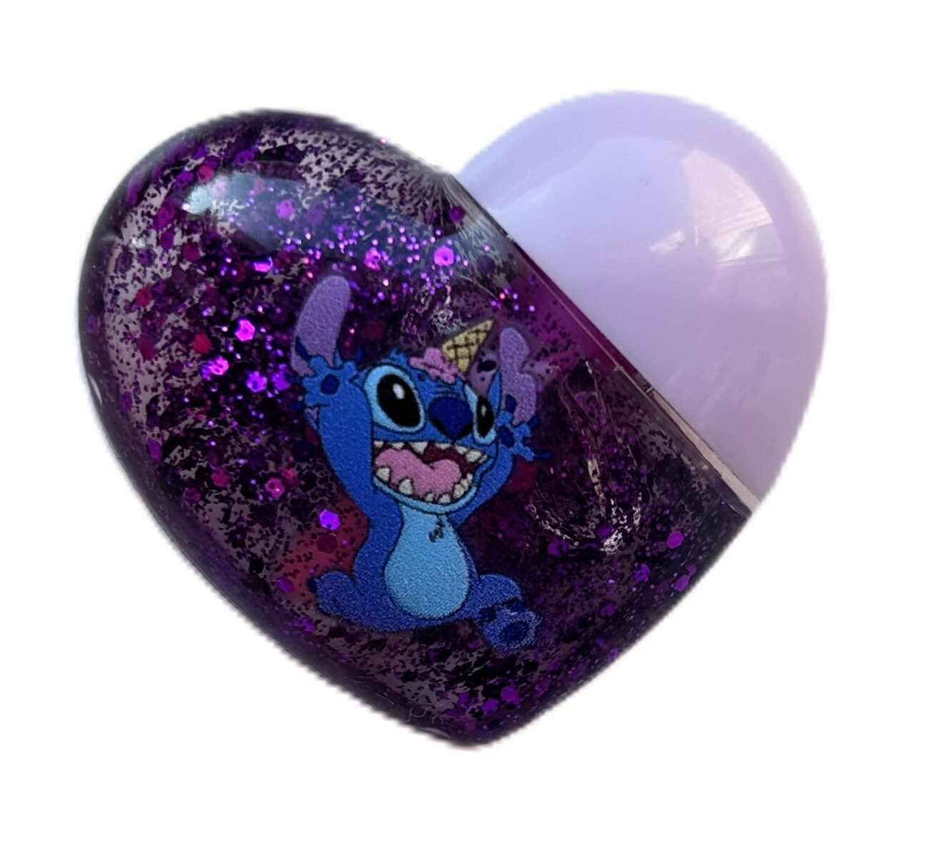 Stitch spalvą keičiantis lūpų blizgis – širdelės formos dizainas 10 g. (violetinė pakuotė)
